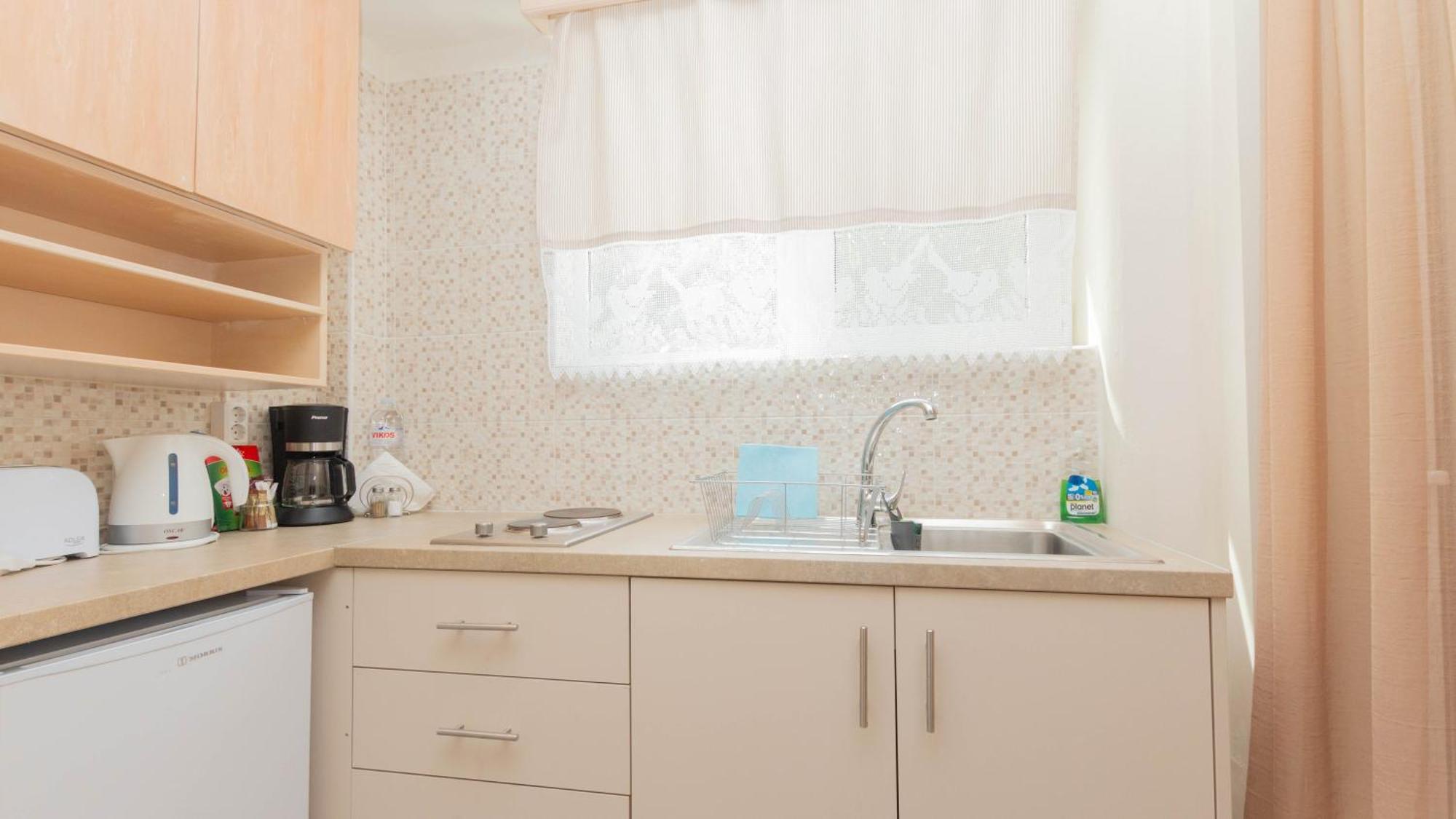 تولو Akrotopi Apartments & Studios الغرفة الصورة
